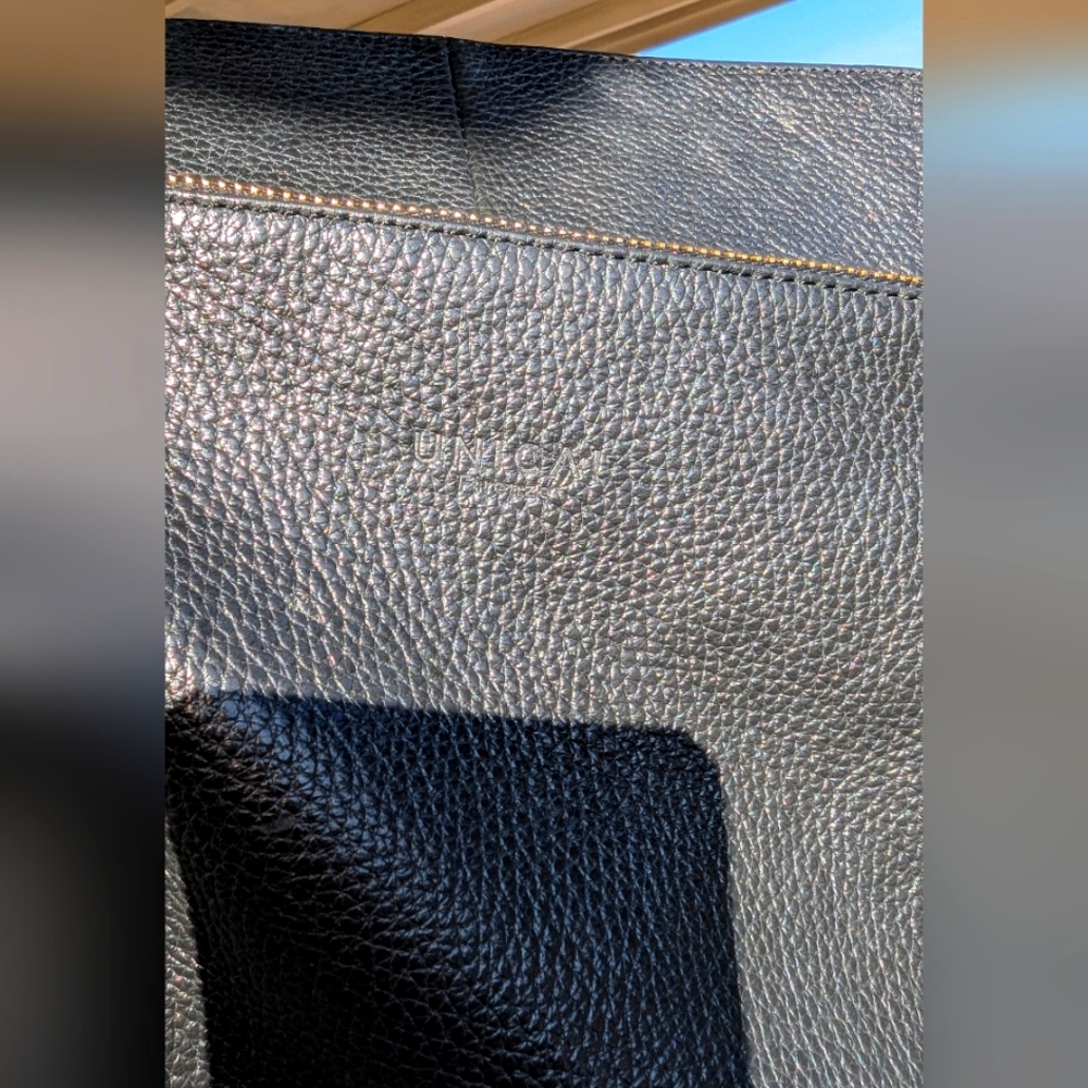firenze Única black leather backpack purse
